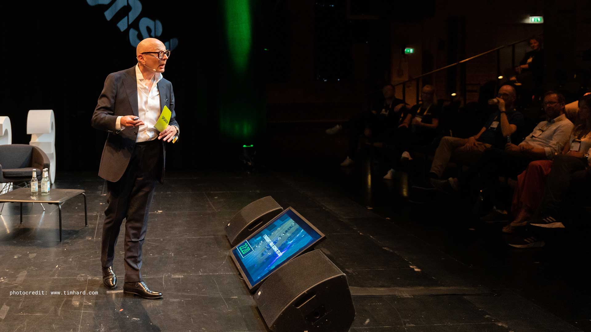 Marcus John Henry Brown mid-keynote on stage at re:publica